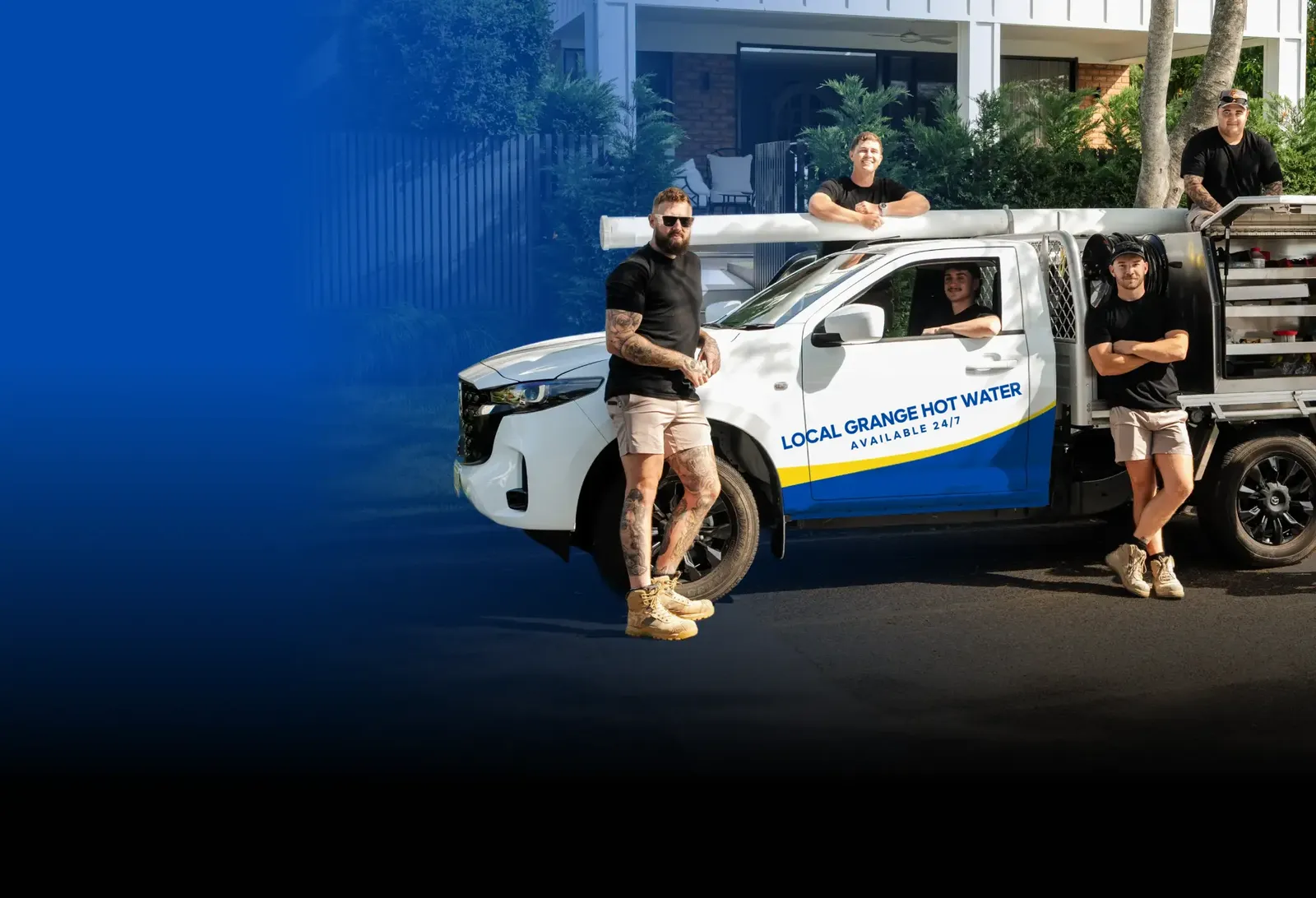 Local Grange Hot Water team with the ute